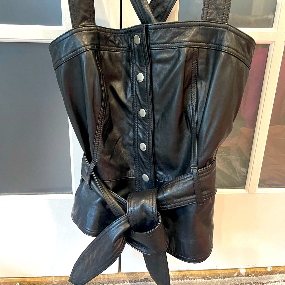 NWOT black leather vest with leather belt and snap closet. Size M Marissa Webb